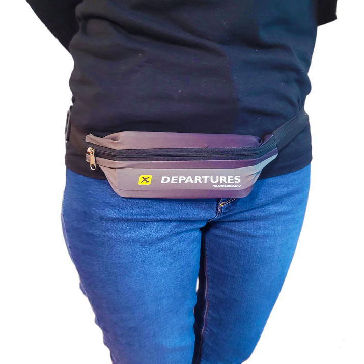 RIÑONERA ULTRADELGADA - AEROPUERTO